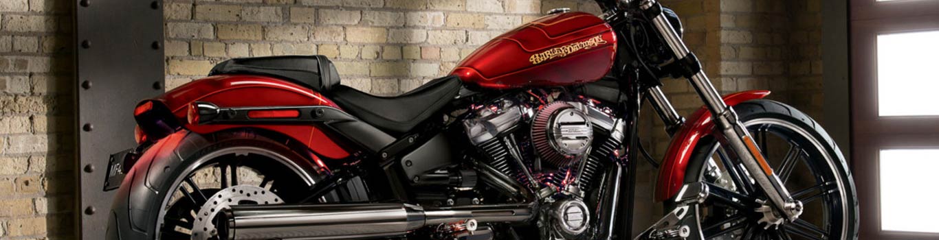 A close-up of a red Harley-Davidson motorcycle.